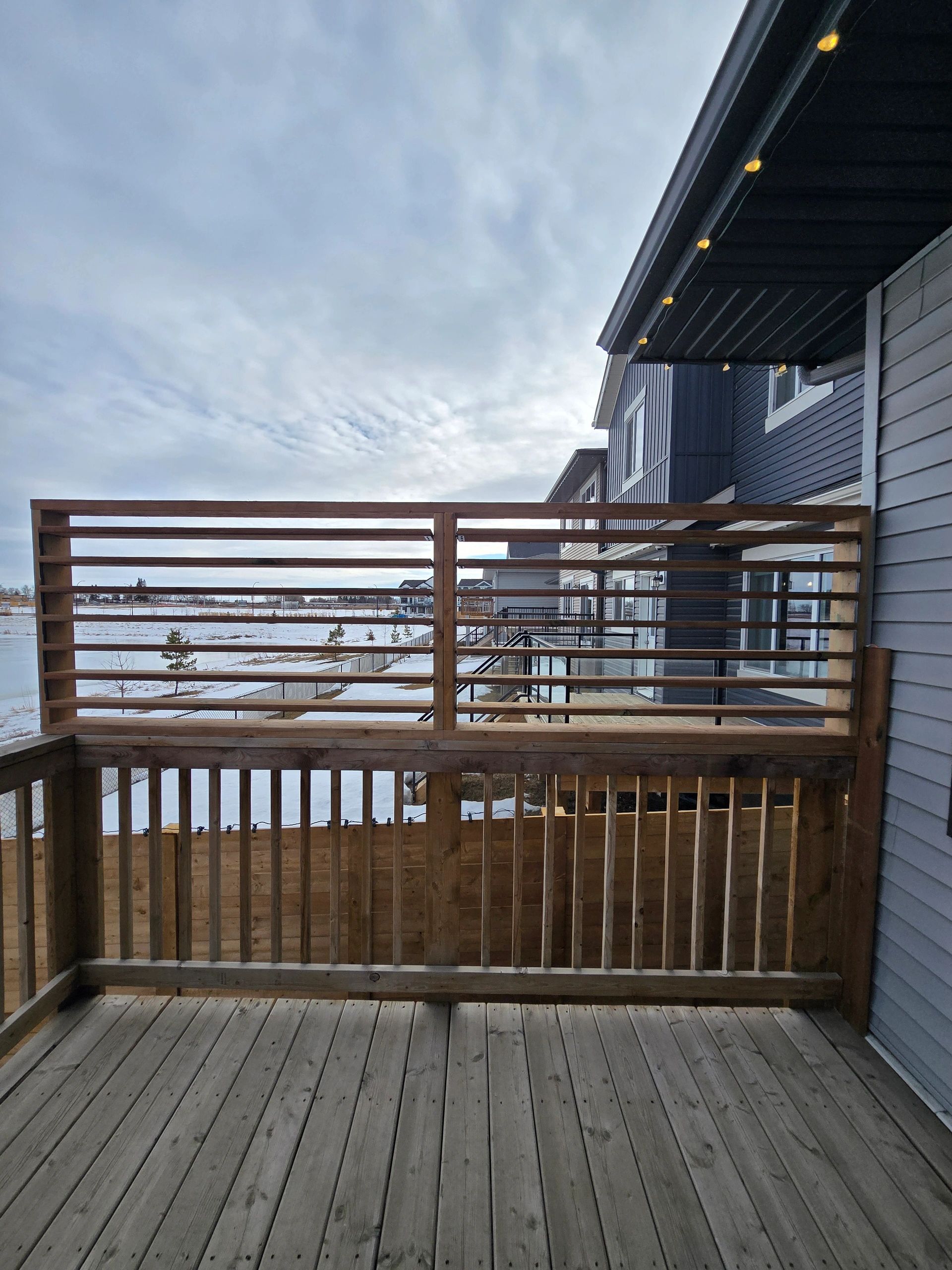 Waterfront deck with pergola